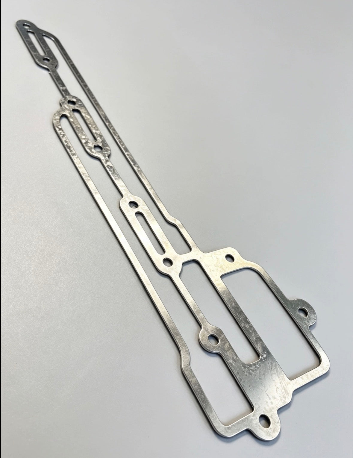 C910E1468/1MM>6MM - Gasket-Scavenge Manifold 1mm to 6mm