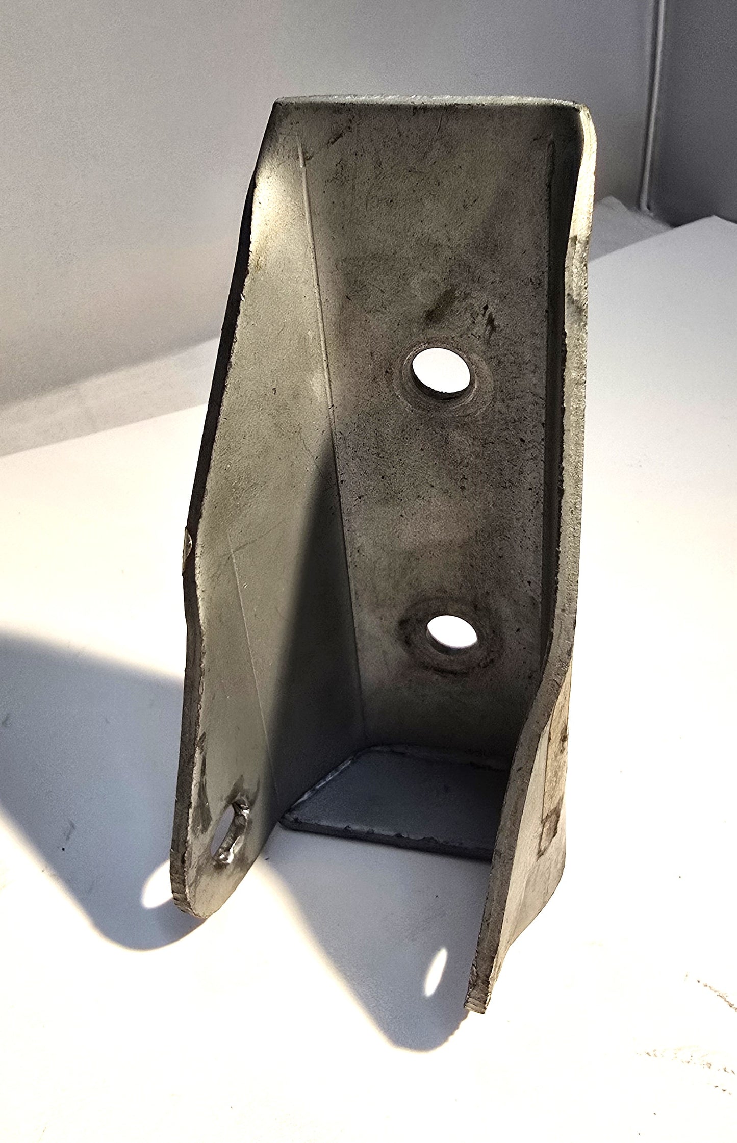 A111C0034F - Bracket-Damper Top RH