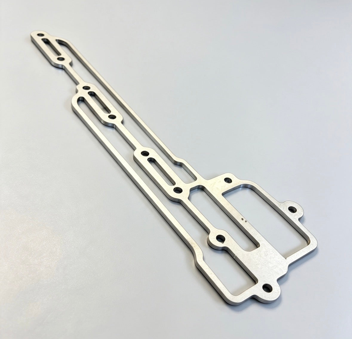 C910E1468/1MM>6MM - Gasket-Scavenge Manifold 1mm to 6mm
